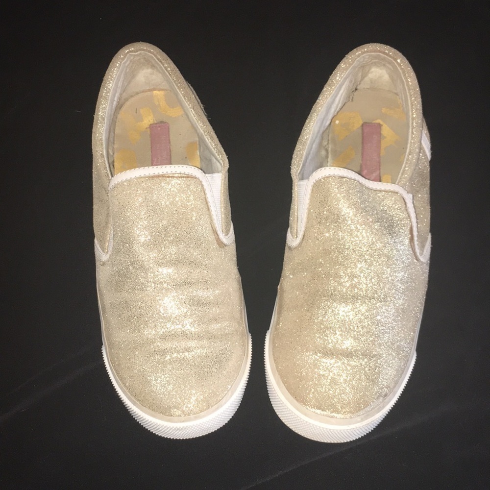 Gold slip on sneakers by Isaac Mizrahi New York